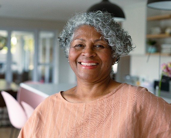 Closeup of woman smiling at home